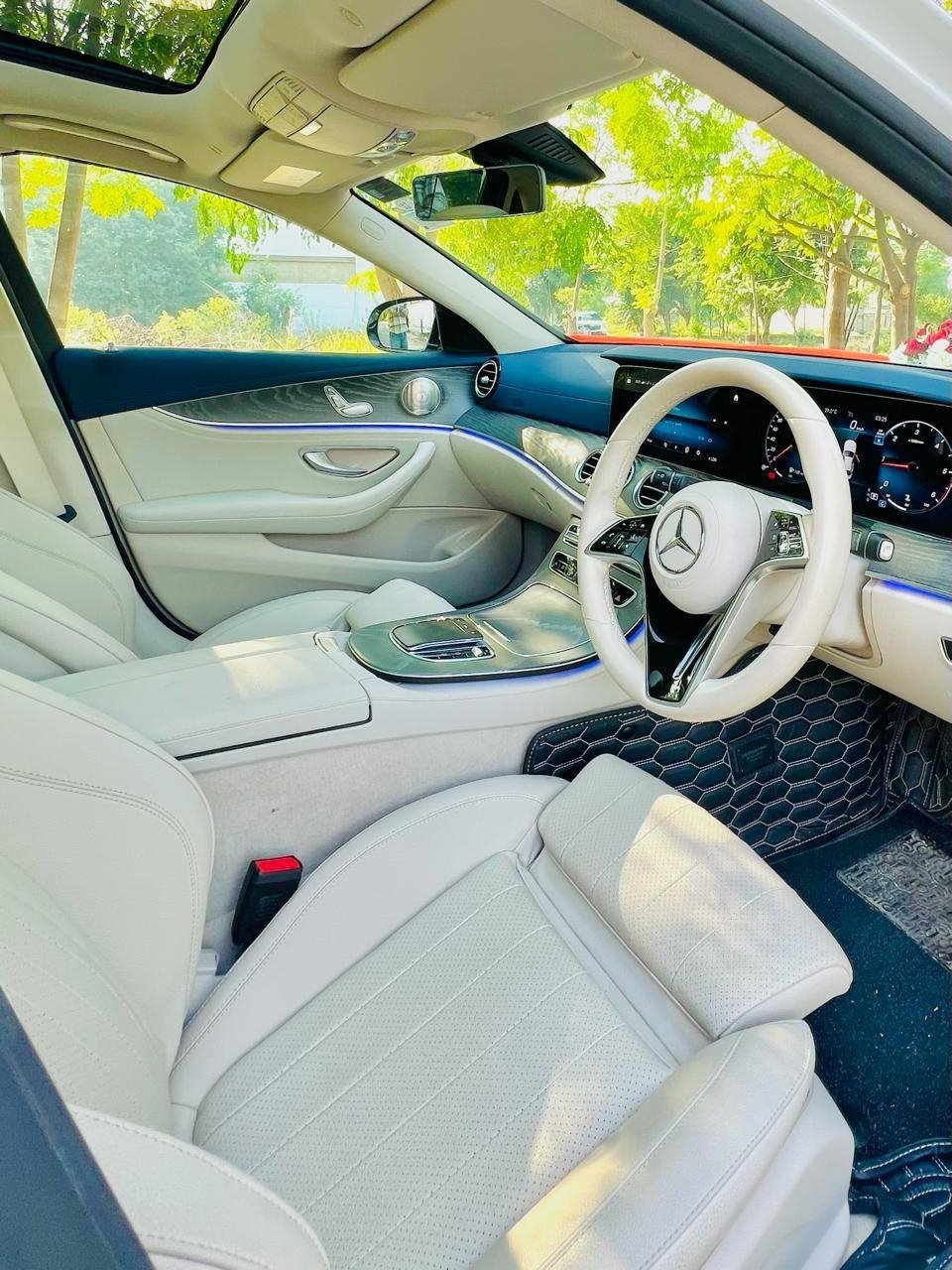 Cream leather front seats and dashboard of the Mercedes-Benz E-Class